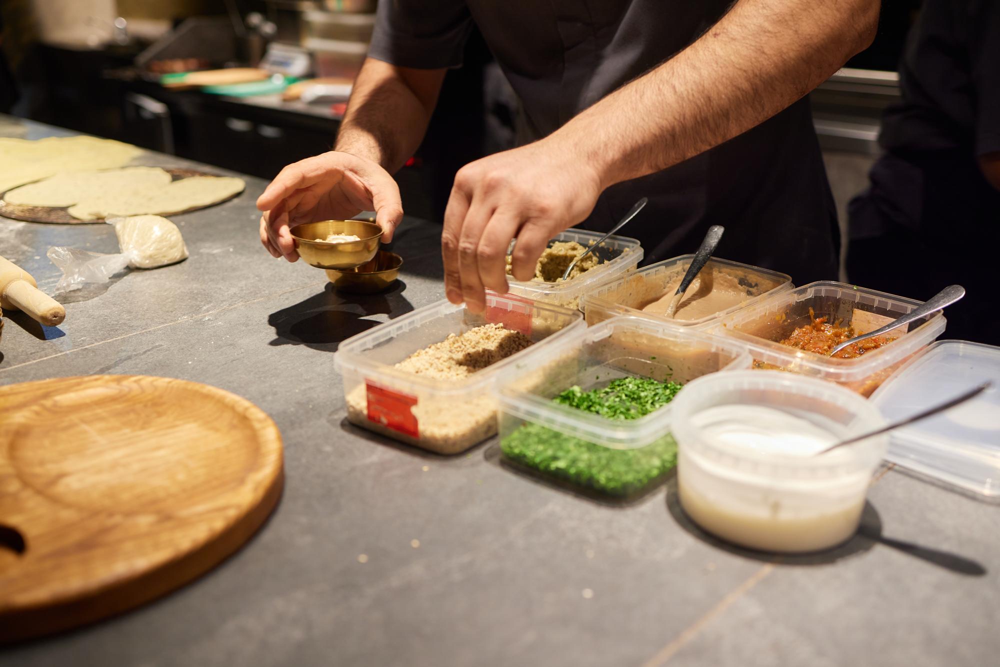 Team preparing catering boxes
