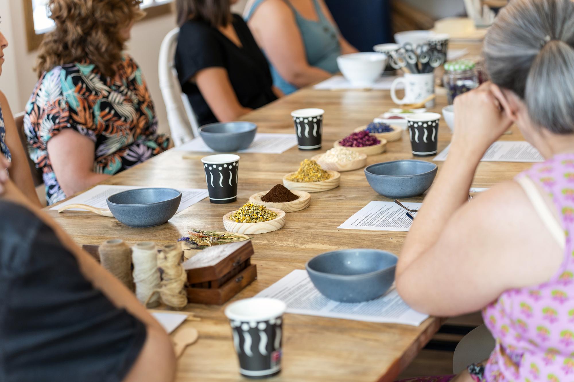 Workshop table with participants tasting